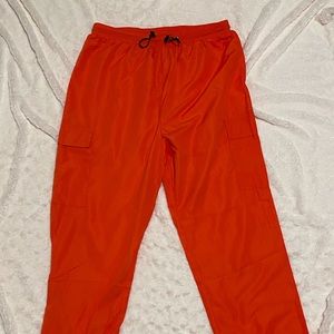 prettylittlething orange windbreaker pants